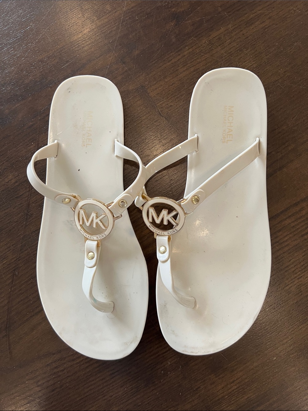 Michael Kors White Jelly Sandals with Gold MK Medallions